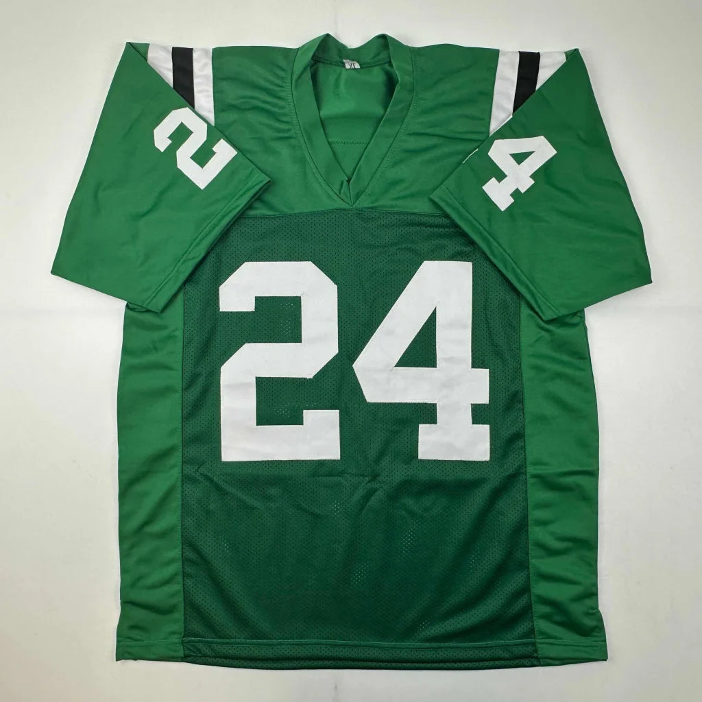 Green football jersey with white 24 number from Own This Epic Revis 24 autographed professional sports jersey