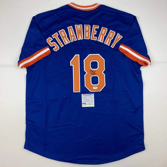 Blue professional sports league custom jersey with strawberry 18 orange lettering and signature