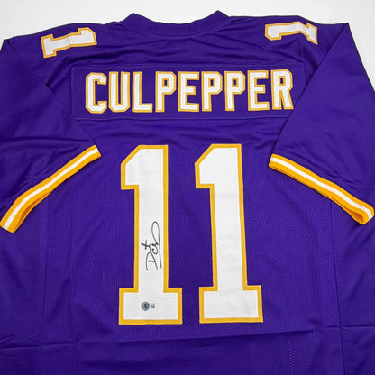 Autographed Daunte Culpepper Minnesota Purple Football Jersey Beckett BAS COA | Certified Authentic Signed Memorabilia | vintageantiquesgifts.com