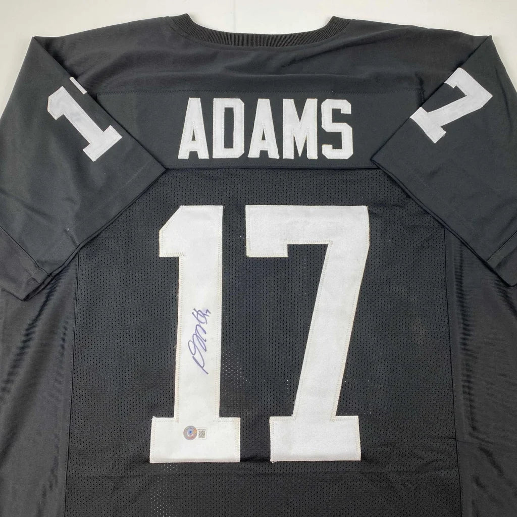 Back of black custom davante adams football jersey number 17 with signature for professional sports league use