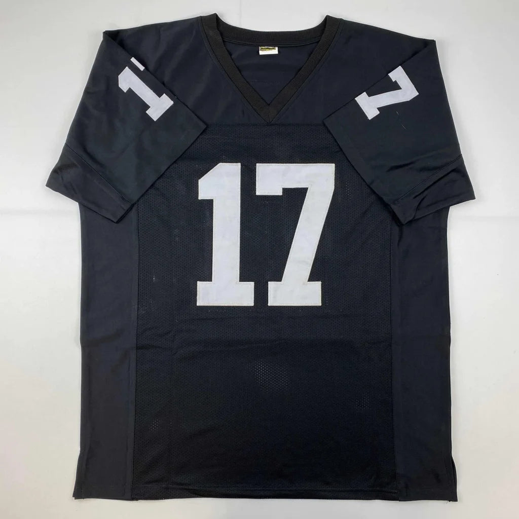 Autographed Davante Adams black custom football jersey with white number 17 and v-neck collar for professional sports league