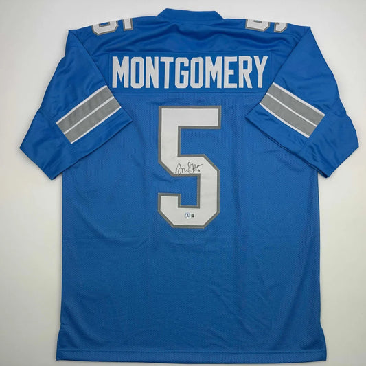Autographed David Montgomery Detroit Blue Football Jersey Beckett BAS COA | Hall of Fame Sports Memorabilia | vintageantiquesgifts.com