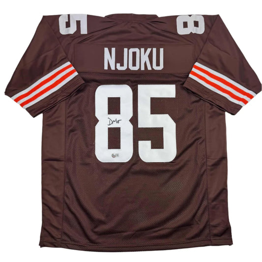 Brown custom jersey with white and orange striped sleeves for professional sports league fans