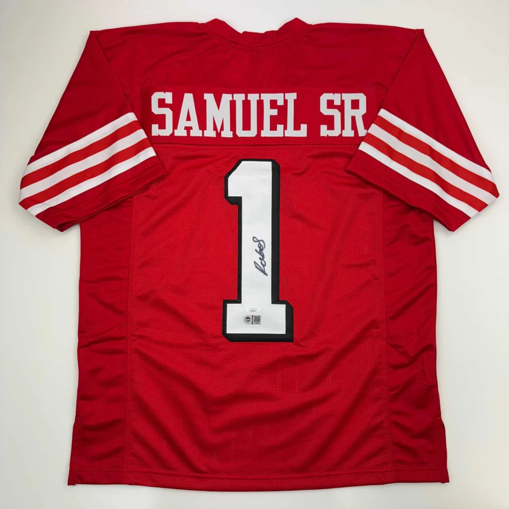 Red professional sports league custom jersey with white stripes and number 1