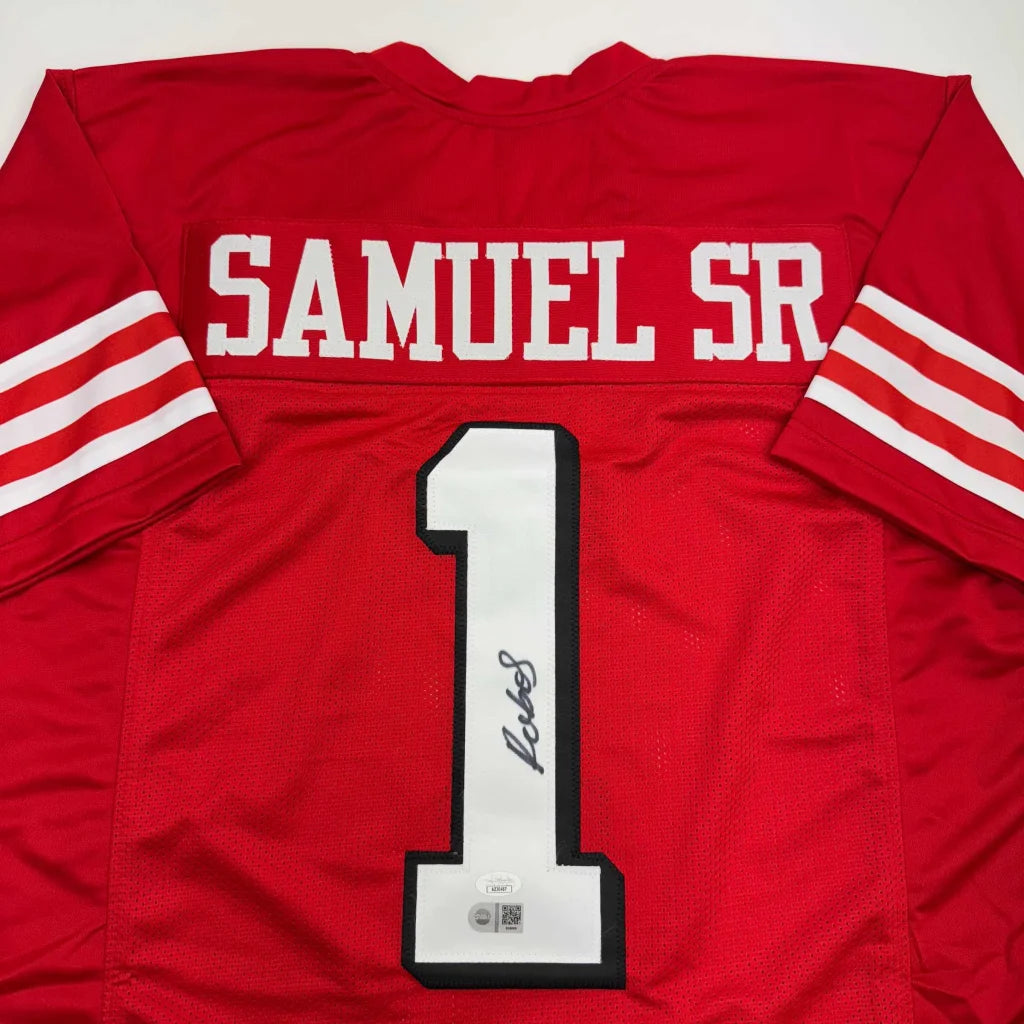Red professional sports jersey with white stripes and signature, perfect for custom sports fans