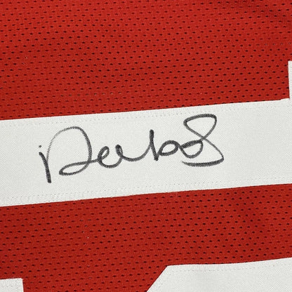 Autographed red custom jersey from professional sports league player for true fans