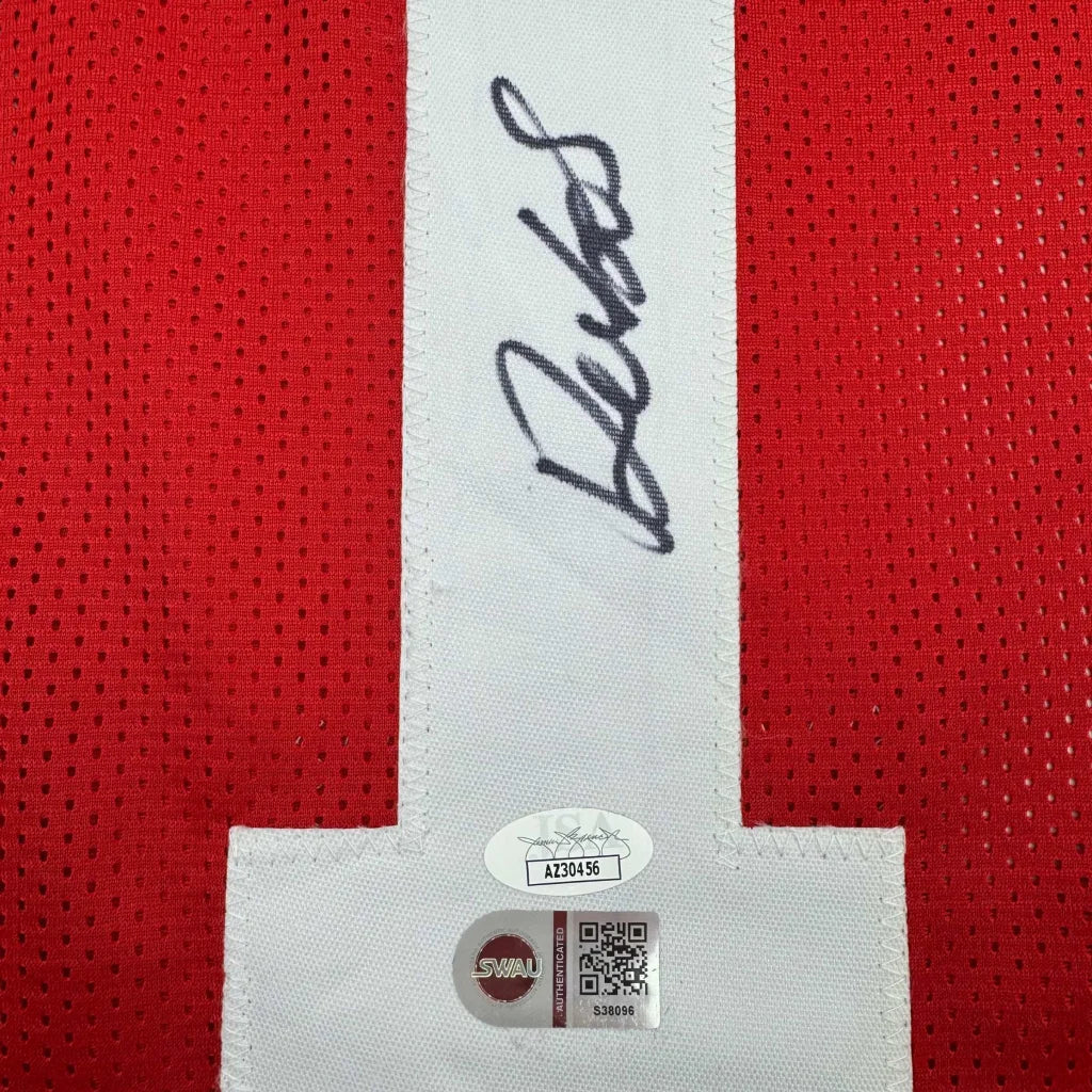 Red custom jersey with autograph and authentication stickers from Samuel SR professional sports league