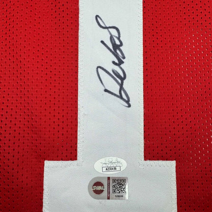 Red custom jersey with autograph and authentication stickers from Samuel SR professional sports league
