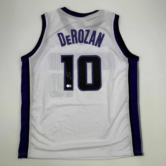 White custom jersey with DeRozan autograph, perfect for sports league fans