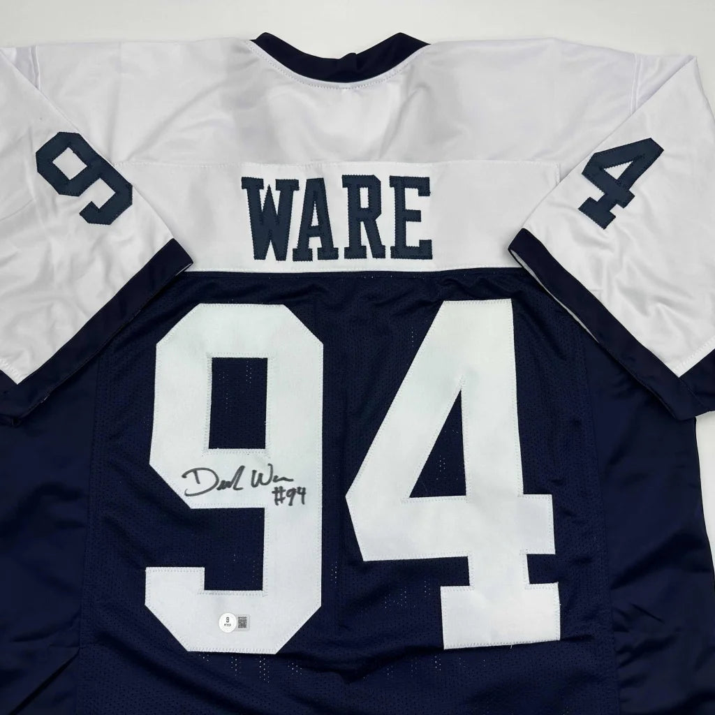 Autographed Demarcus Ware custom jersey in white and navy blue with 94, Beckett BAS COA