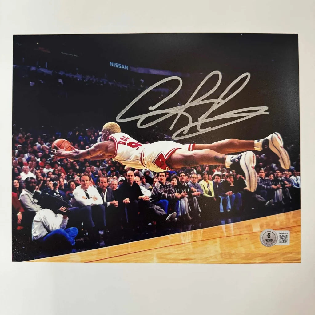 Autographed Michael Jordan mid-dunk Chicago Bulls photo