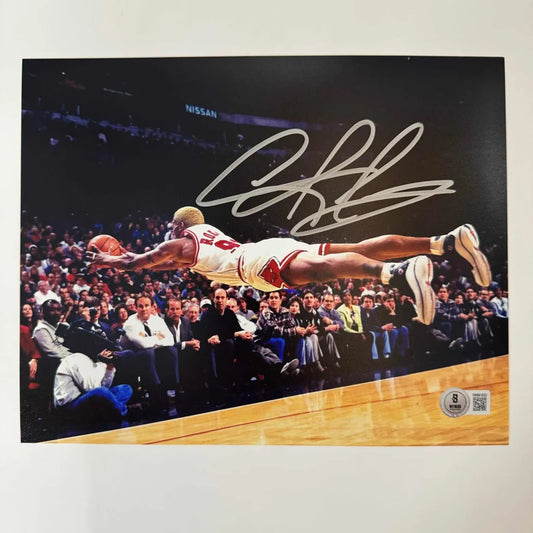 Autographed Michael Jordan mid-dunk Chicago Bulls photo