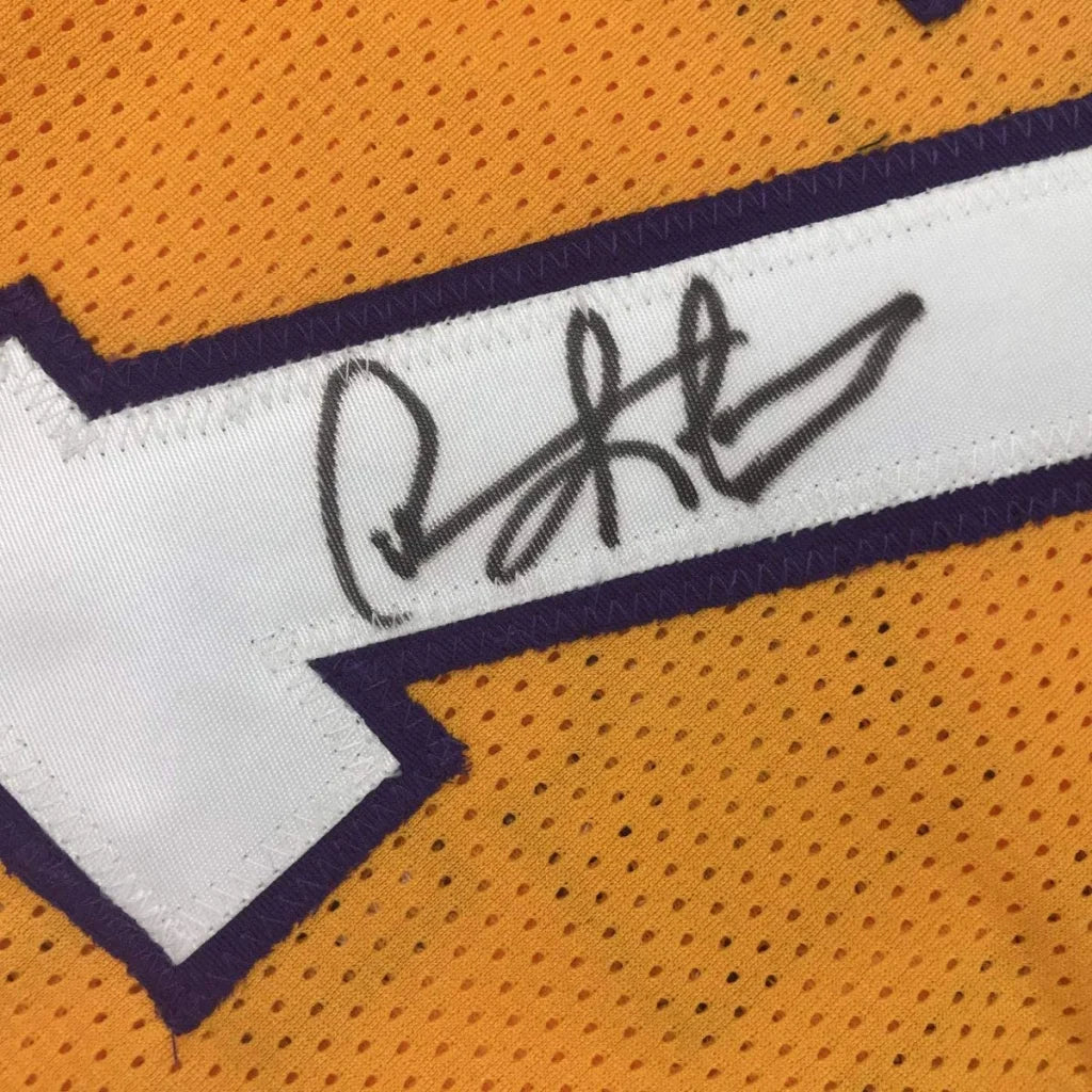 Autographed Dennis Rodman custom jersey on orange mesh with black ink signature