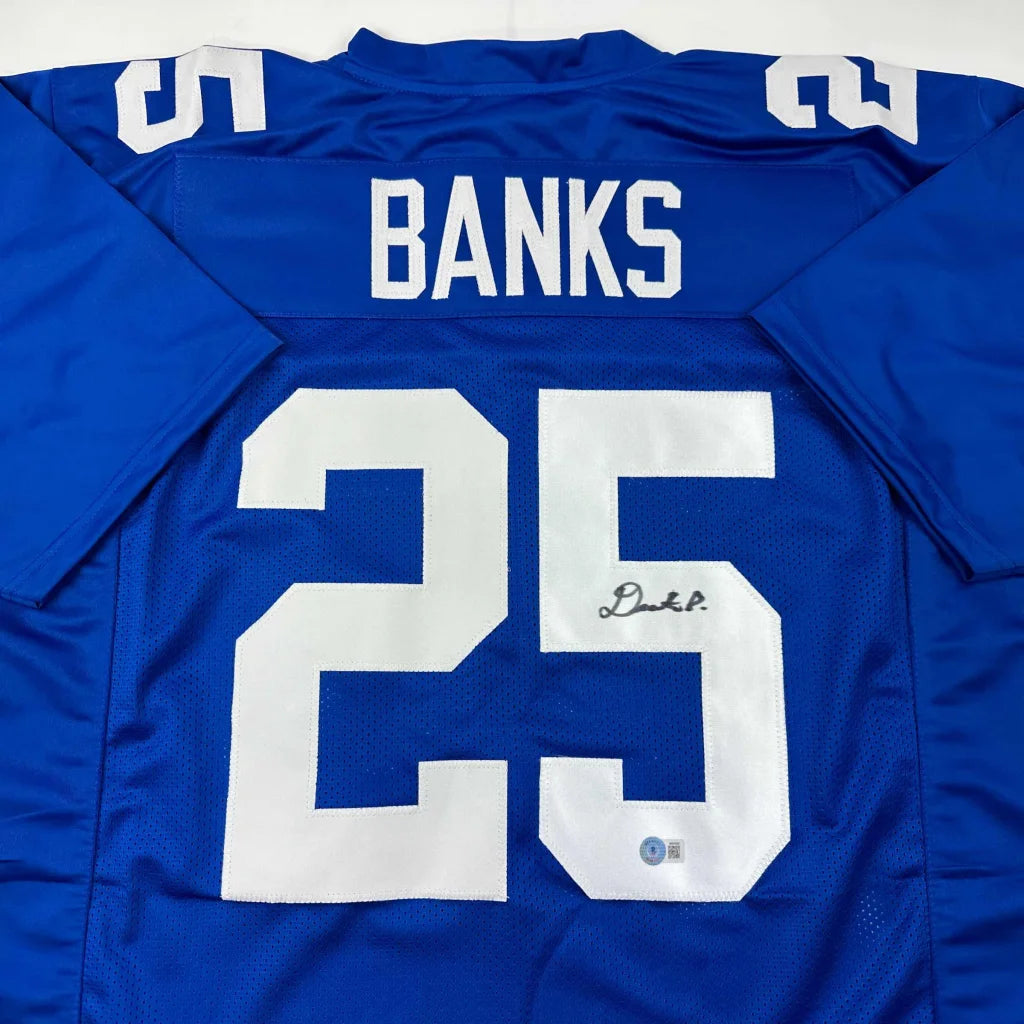 Autographed Deonte Banks New York Blue Football Jersey Beckett BAS COA | Certified Authentic Signed Memorabilia | vintageantiquesgifts.com