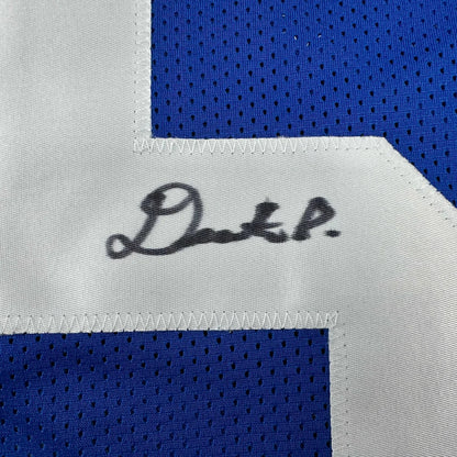 Blue and white mesh custom jersey with black signature for professional sports collectors