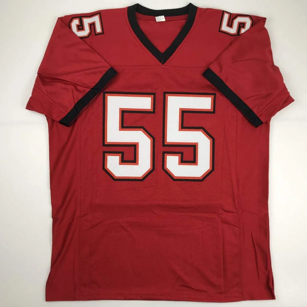 Red custom football jersey with white and black number 55 v-neck collar autographed by derrick brooks from professional sports league