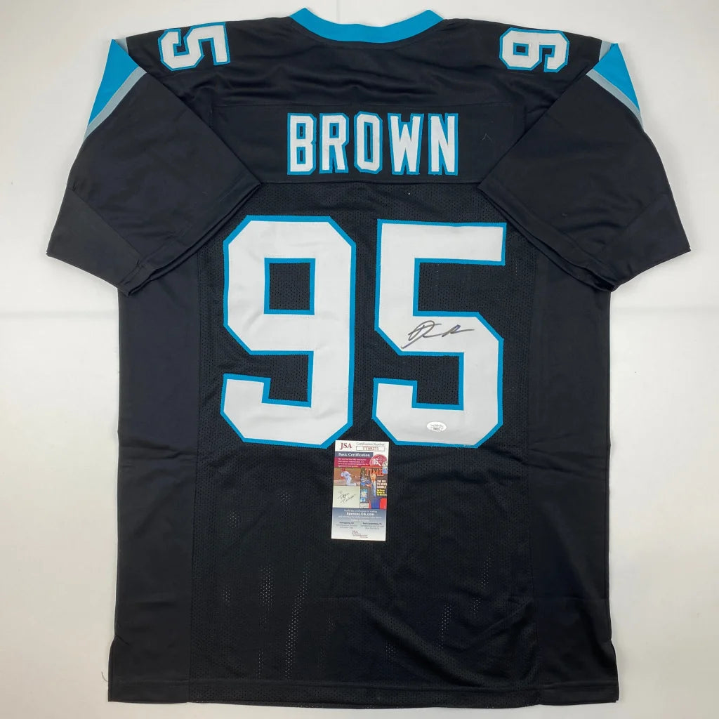Black Carolina Panthers jersey with BROWN 95 signed by athlete, perfect for professional sports fans