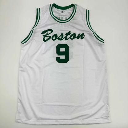 White mesh basketball jersey with green trim and boston 9 in bold green lettering autographed by derrick white for professional sports league fans