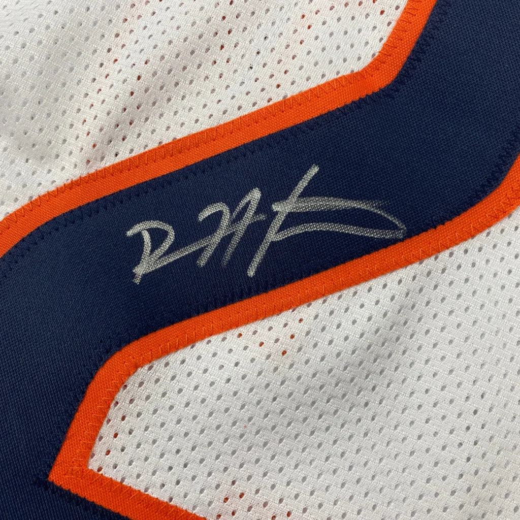 Autographed white and navy custom jersey from Professional Sports League with orange trim
