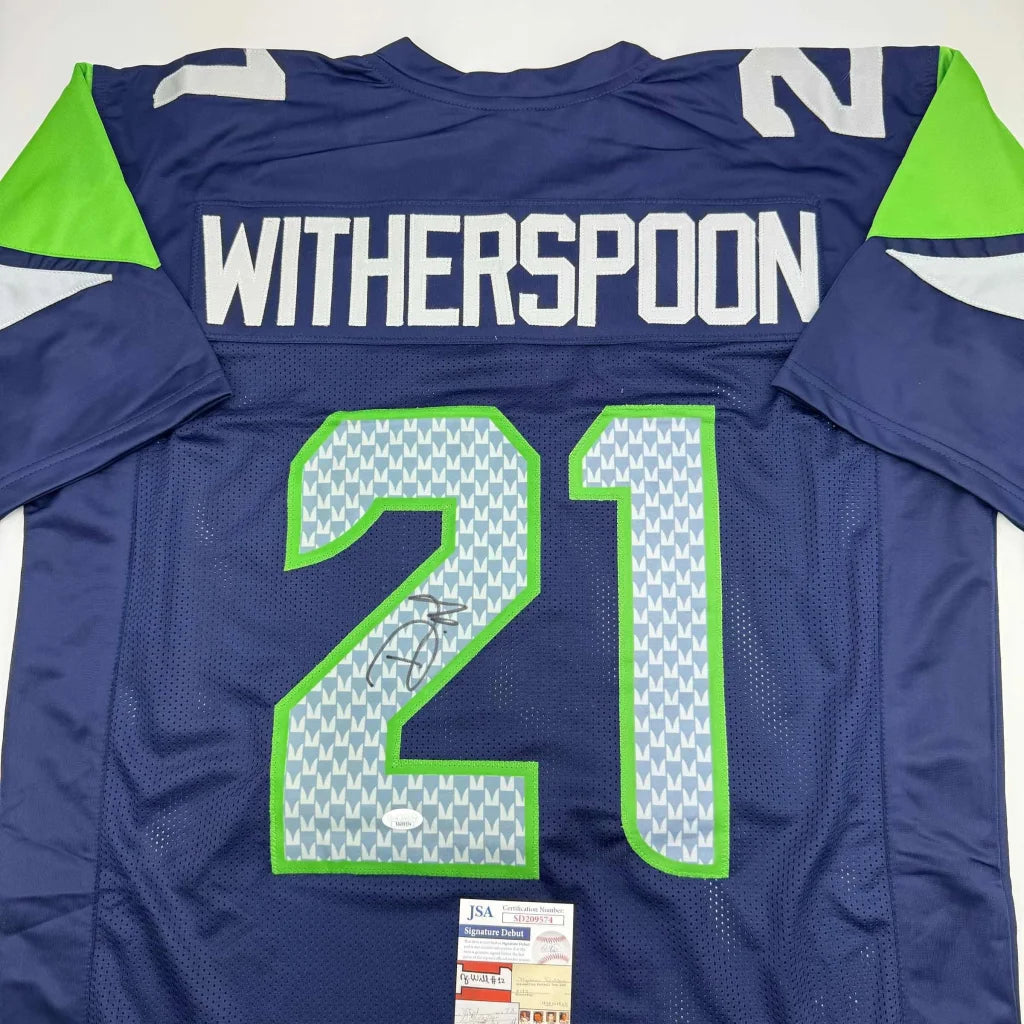 Autographed navy blue and green custom jersey with Witherspoon 21 for professional sports fans