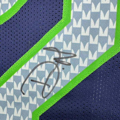 Autographed blue and white patterned custom jersey from professional sports league