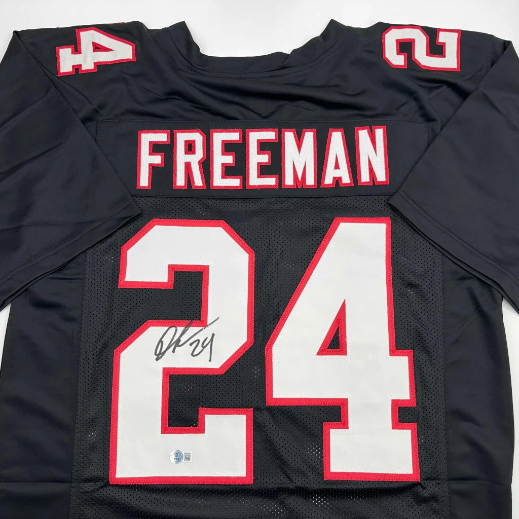 Autographed Devonta Freeman Atlanta Retro Black Football Jersey Beckett BAS COA | Certified Authentic Signed Memorabilia | vintageantiquesgifts.com