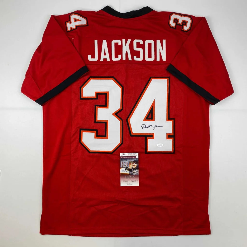 Back view of a red autographed dexter jackson tampa bay custom jersey with white and black trim from a professional sports league