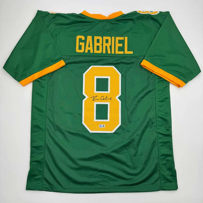 Autographed Dillon Gabriel Oregon green custom jersey with name Gabriel and number 8