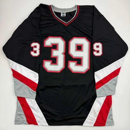 Autographed Dominik Hasek custom jersey in black Buffalo style with white red 39 numerals