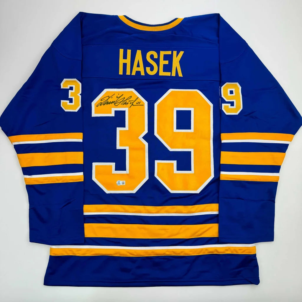 Autographed Dominik Hasek Buffalo Blue Hockey Jersey Beckett BAS COA | Hall of Fame Sports Memorabilia | vintageantiquesgifts.com