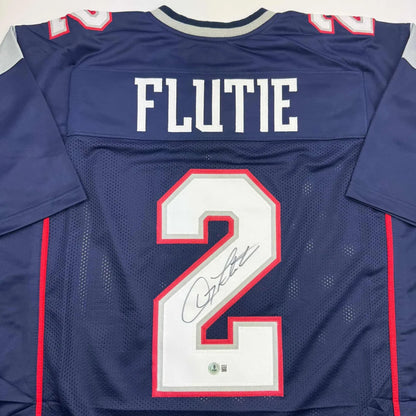 Autographed Doug Flutie New England Blue Football Jersey Beckett BAS COA | Certified Authentic Signed Memorabilia | vintageantiquesgifts.com