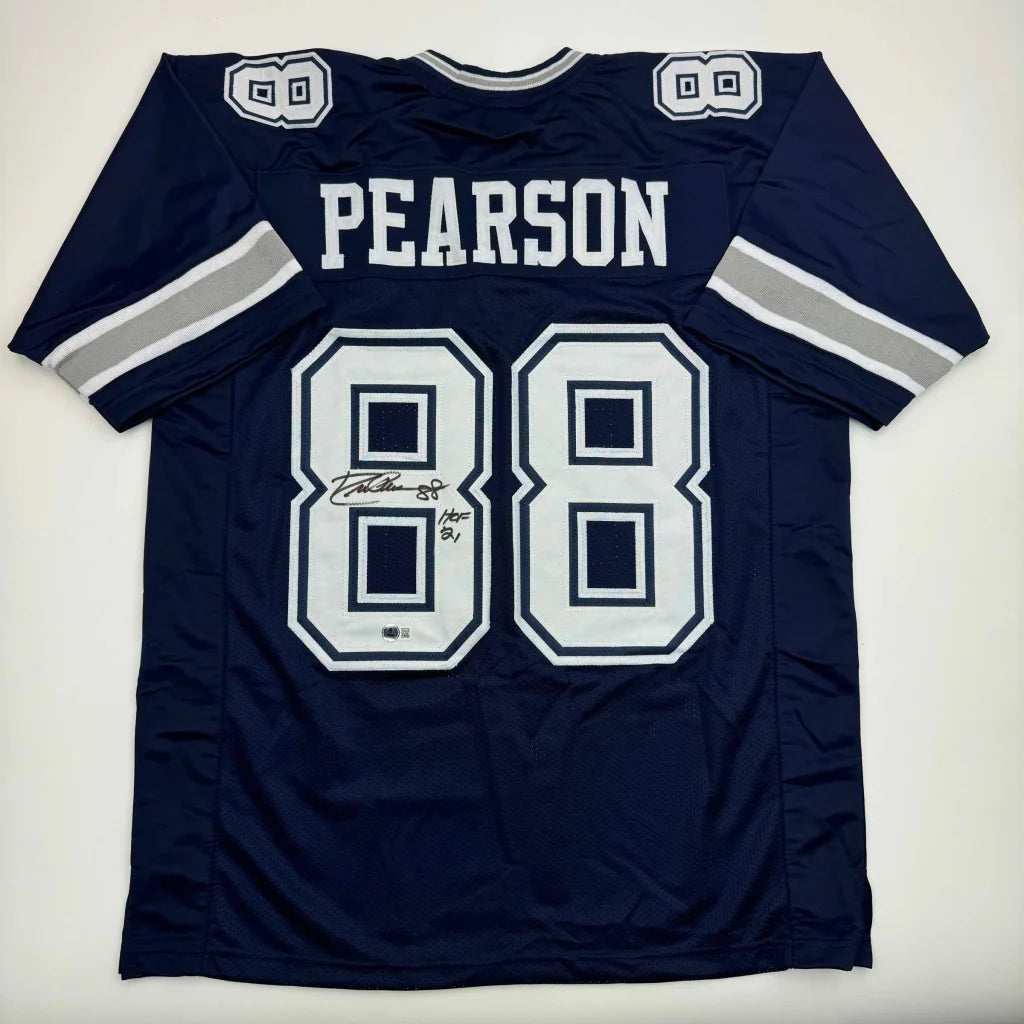 Back view of navy dallas cowboys custom jersey with pearson 88 in white and silver trim signed for professional sports league