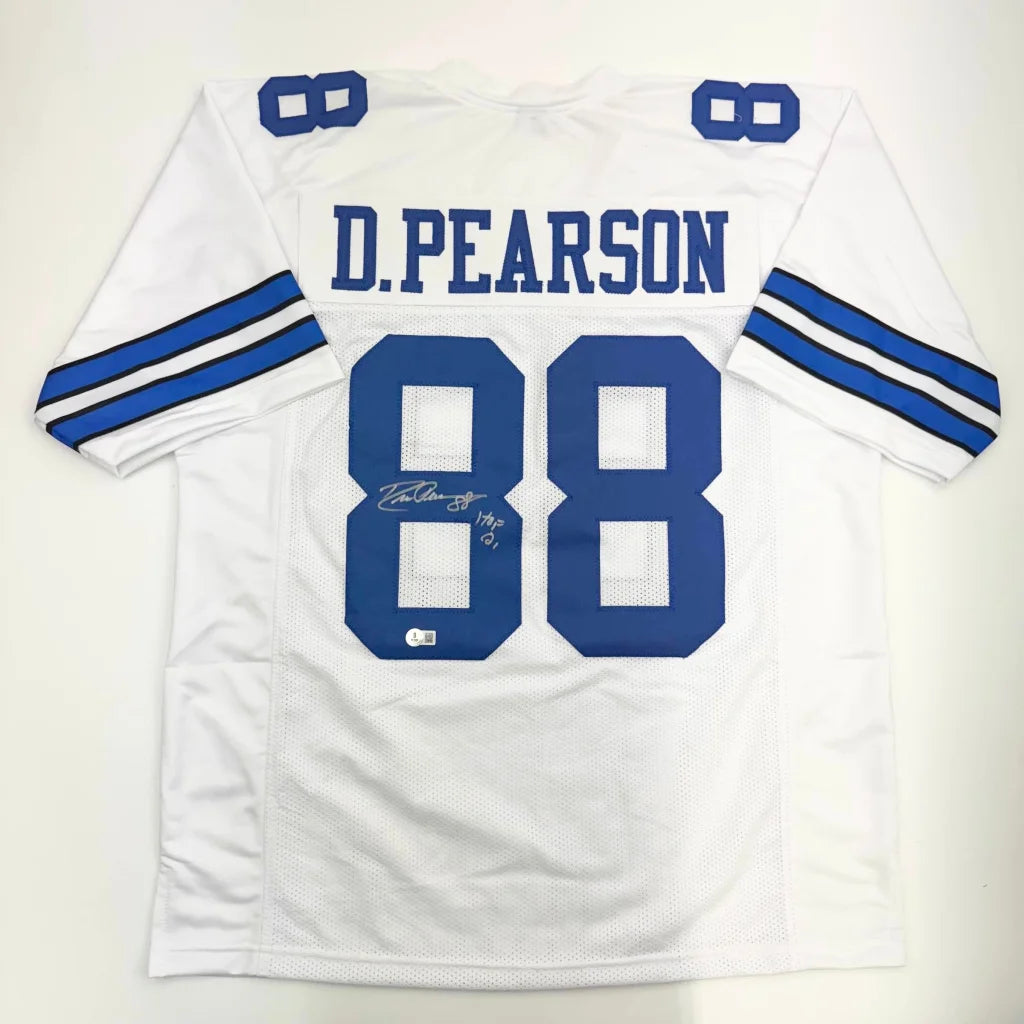 White and blue Dallas Cowboys Drew Pearson custom jersey with signature from professional sports league