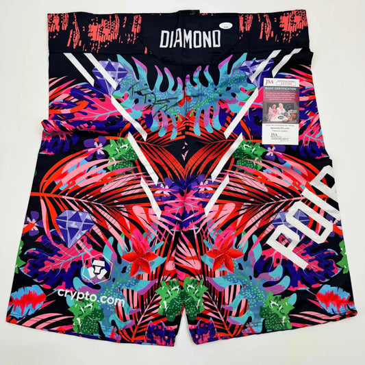 Colorful tropical-patterned athletic shorts with autograph and certification tag for Authentic Tropical Flame product