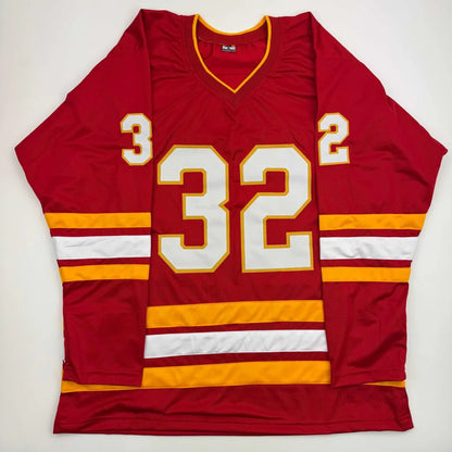 Autographed Dustin Wolf Calgary red custom jersey, professional sports league