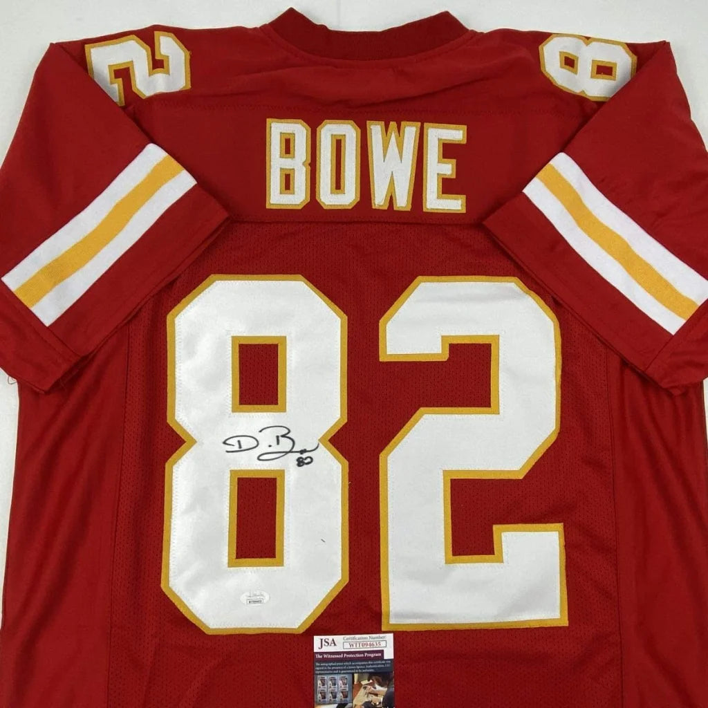 Back of a red kansas city chiefs custom jersey with white and gold lettering signed by dwayne bowe from professional sports league