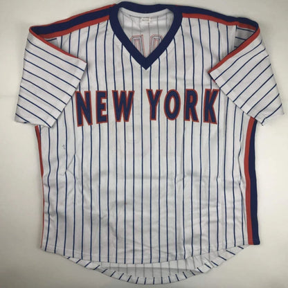 White pinstriped custom jersey with NEW YORK in red and blue trim for professional sports fans
