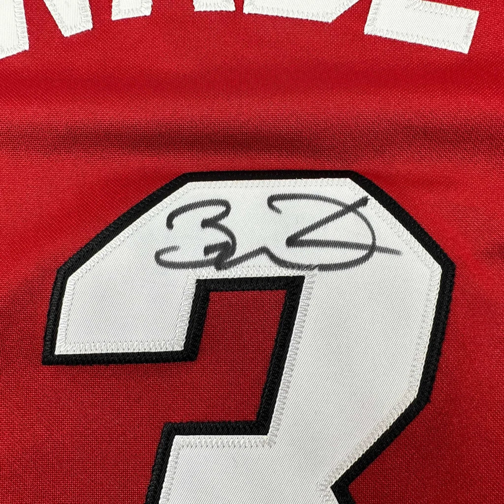 Red Dwyane Wade Miami Heat jersey with black autograph and third party authentication