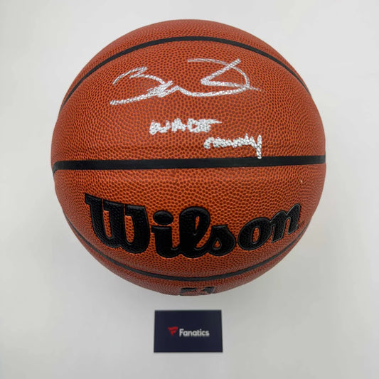 Autographed Wilson basketball with third-party authentication on display