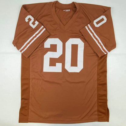Autographed Earl Campbell Texas Orange Football Jersey Beckett BAS COA | Authenticated Signed Sports Jersey | vintageantiquesgifts.com