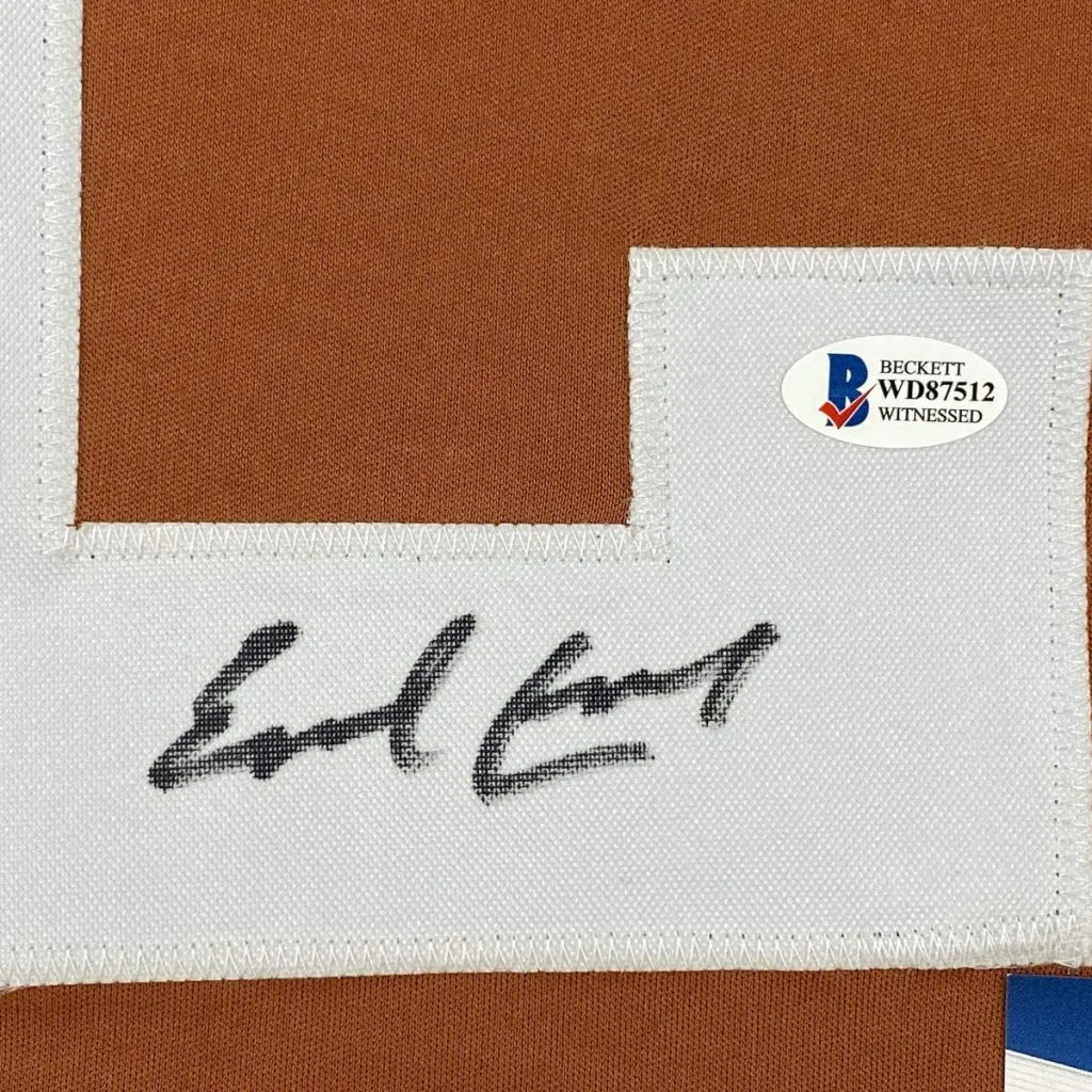 Autographed Earl Campbell Texas Orange Football Jersey Beckett BAS COA | Authenticated Signed Sports Jersey | vintageantiquesgifts.com
