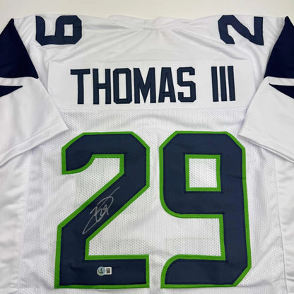 Autographed Earl Thomas III Seattle White Football Jersey Beckett BAS COA | Certified Authentic Signed Memorabilia | vintageantiquesgifts.com