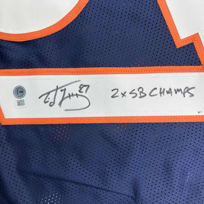 Autographed blue and orange professional sports league jersey featuring McCaffrey 87 signature