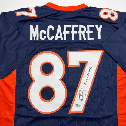 Autographed McCaffrey 87 professional sports league jersey with Denver Broncos jersey image