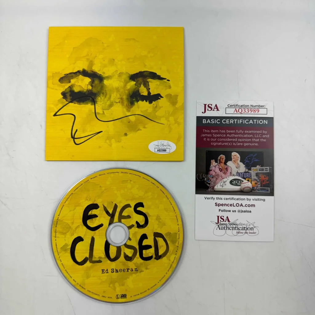 Autographed Ed Sheeran Eyes Closed CD with minimalist face design
