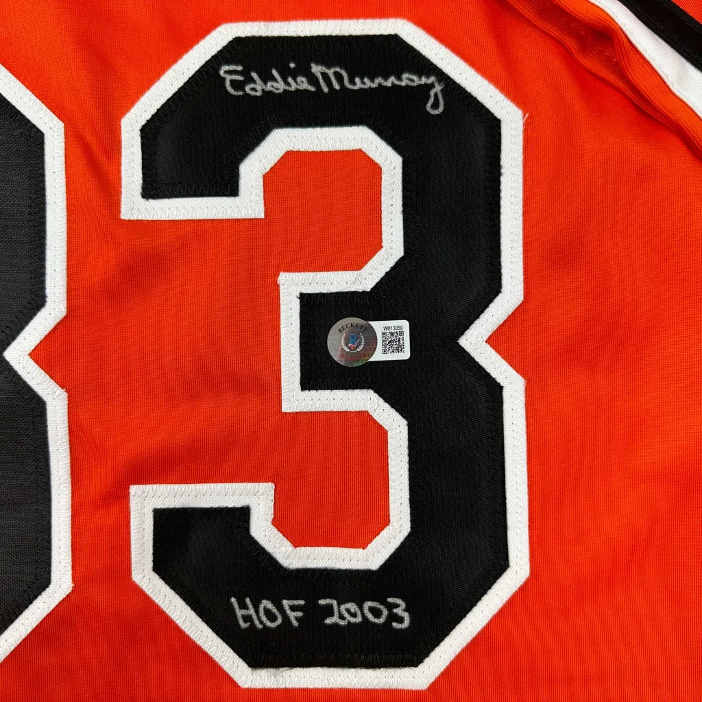 Orange sports jersey with black and white number 3 from Eddie Murray signed professional sports league