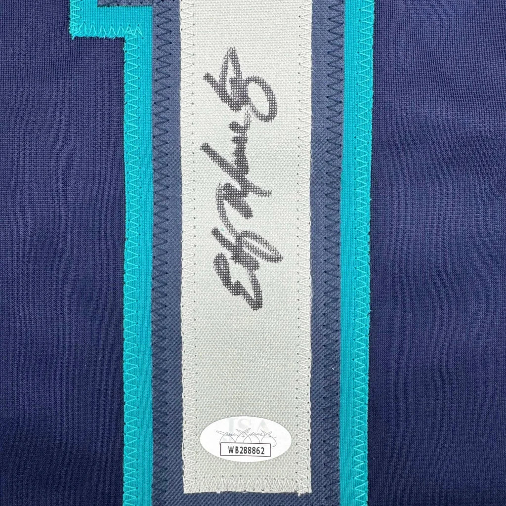 Autographed navy blue fabric with teal and gray stripes from Martinez sports league jersey