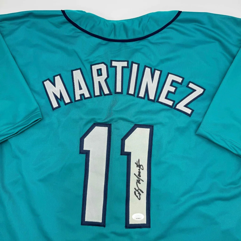 Teal custom jersey with Martinez 11 autograph from professional sports league