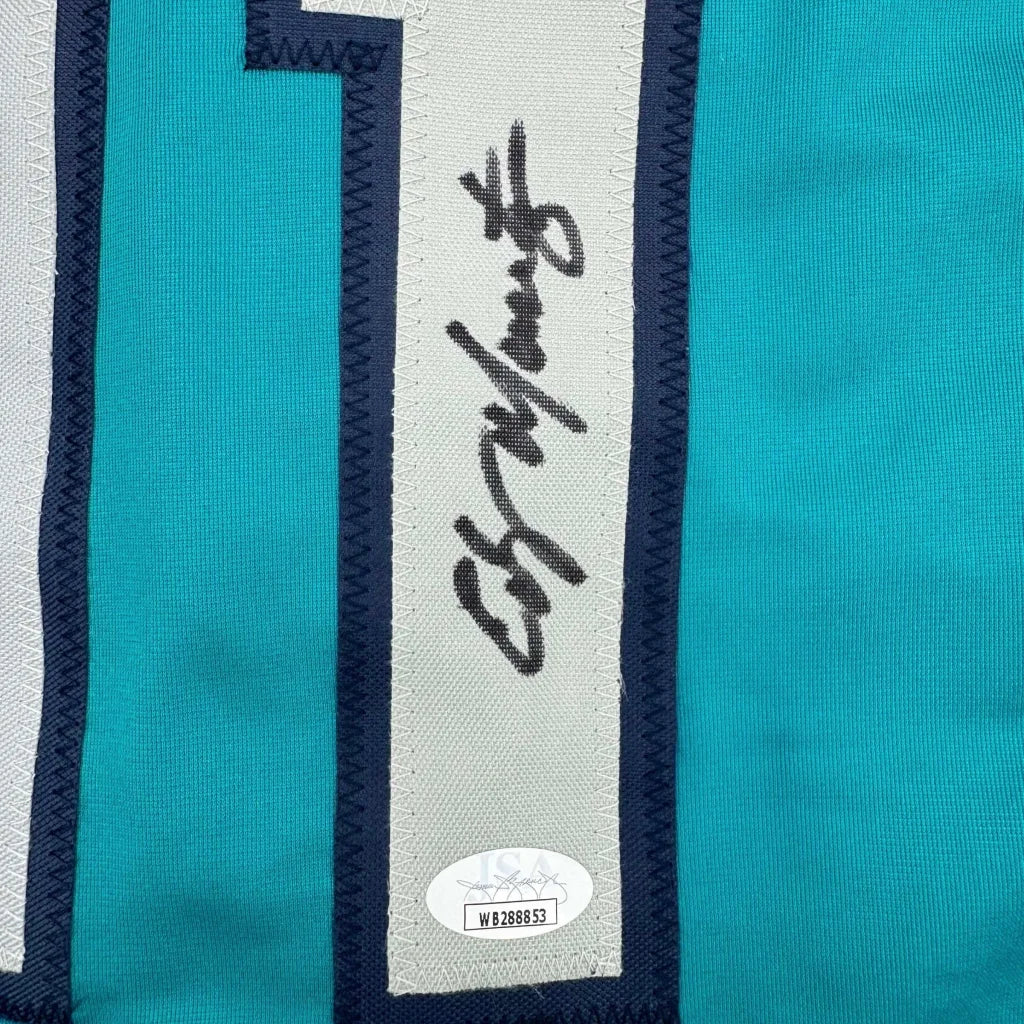 Teal custom jersey from Professional Sports League with black autograph and auth sticker