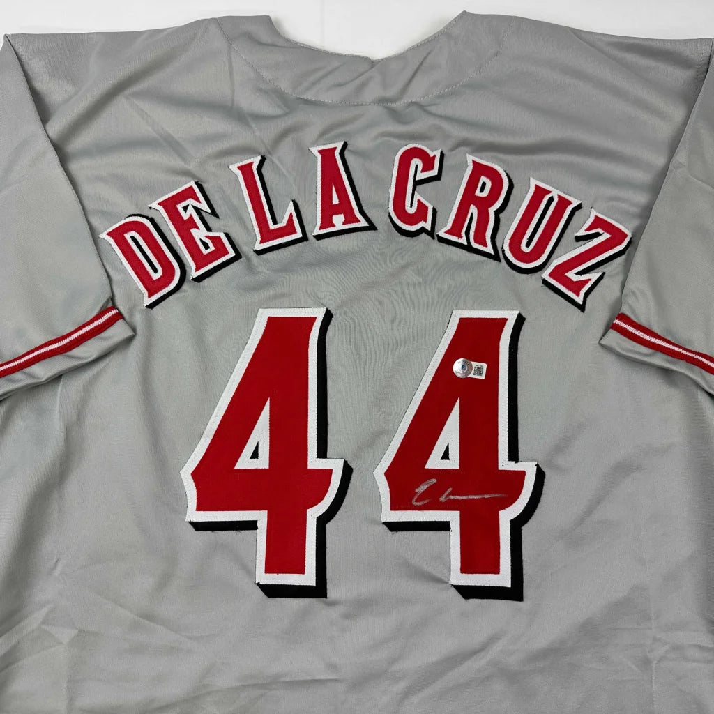 Gray custom jersey with De La Cruz 44 autograph for professional sports fans and collectors
